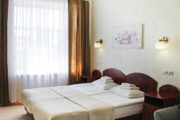 Фото номера Стандартный трехместный номер Отель Hotel Sluch г. Starokostyantyniv 2